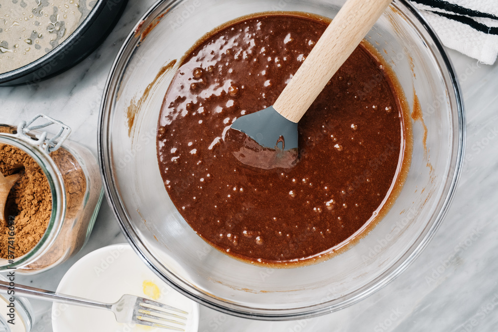 Preparing batter for flourless chocolate cake Preparing batter for flourless chocolate cake