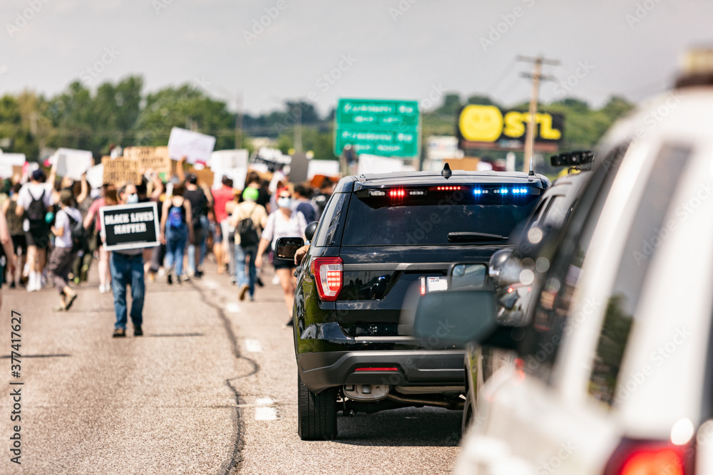 BLM: Police Vehicles Escort Peaceful Protestors On Highway BLM: Police Vehicles Escort Peaceful Protestors On Highway