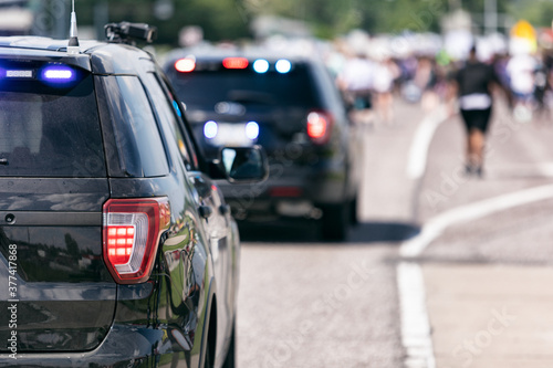 Wallpaper Mural BLM: Police Vehicles Escort Peaceful Protestors On Highway Torontodigital.ca