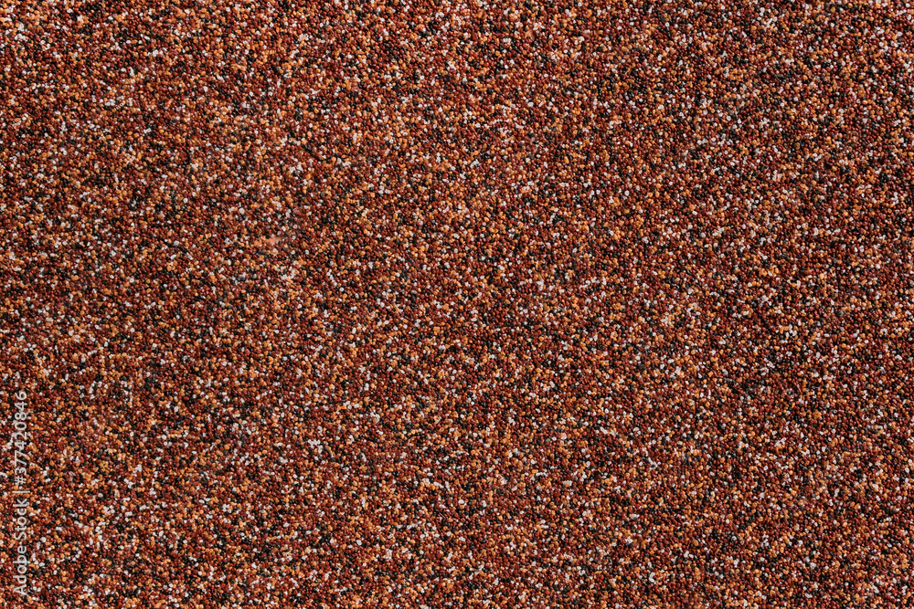 Brown texture background wall of small stones, close up Brown texture background wall of small stones, close up