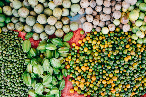 A large quantity of green fruit and vegetables