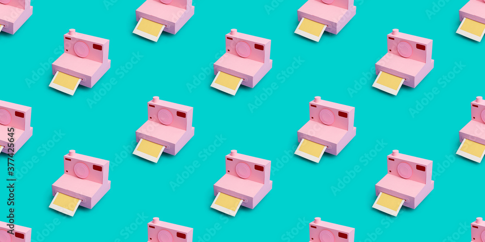 © CACTUS Creative Studio/Stocksy - Retro camera made with paper in a turquoise background with copy space