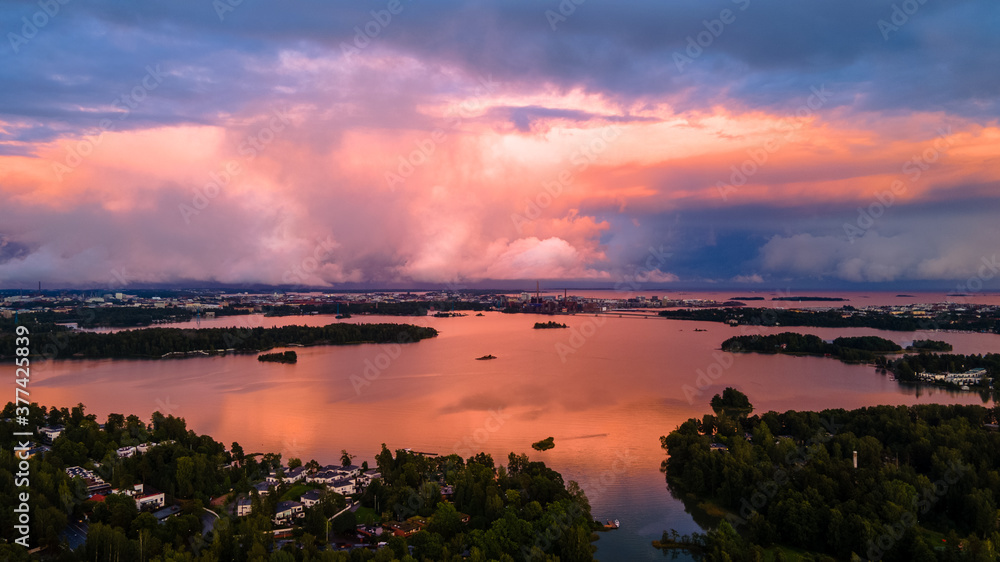 Gorgeous sunset is seen in Helsinki with the beautiful reflection on the Baltic Sea