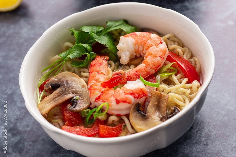 Prawn noodle soup with mushrooms and peppers