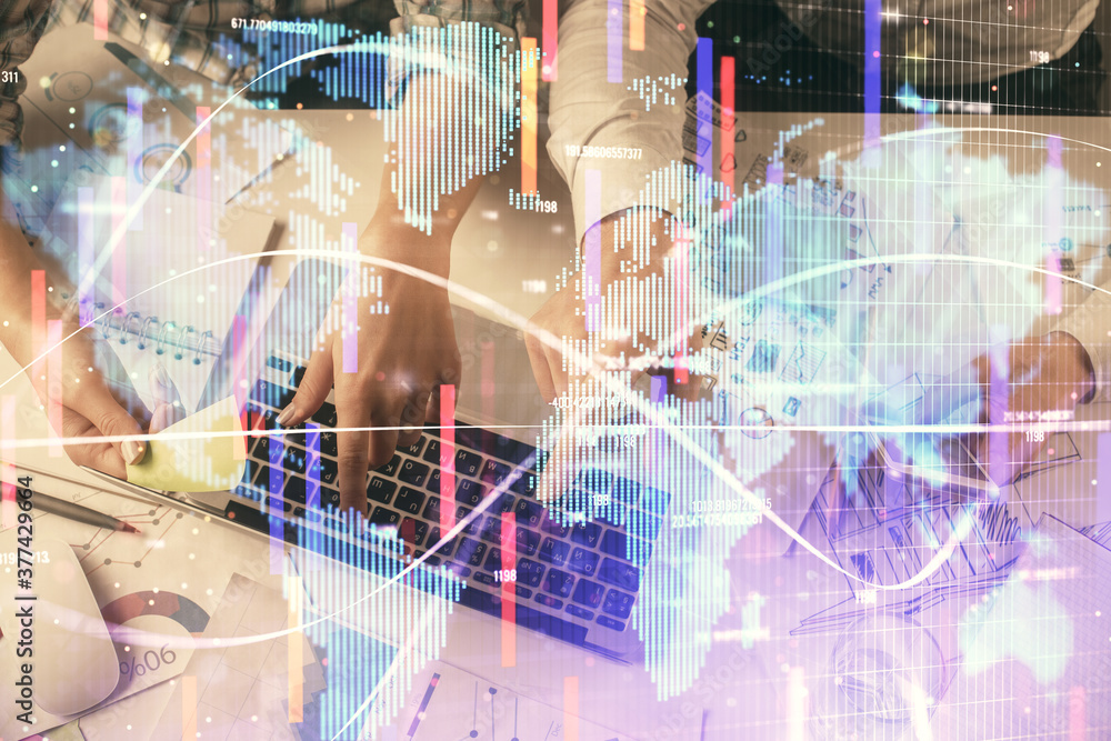 Double exposure of man and woman working together and business theme hologram drawing. Computer background. Top View. Double exposure of man and woman working together and business theme hologram drawing. Computer background. Top View.