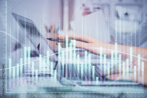 Wallpaper Mural Multi exposure of woman hands typing on computer and financial graph hologram drawing. Stock market analysis concept. Torontodigital.ca