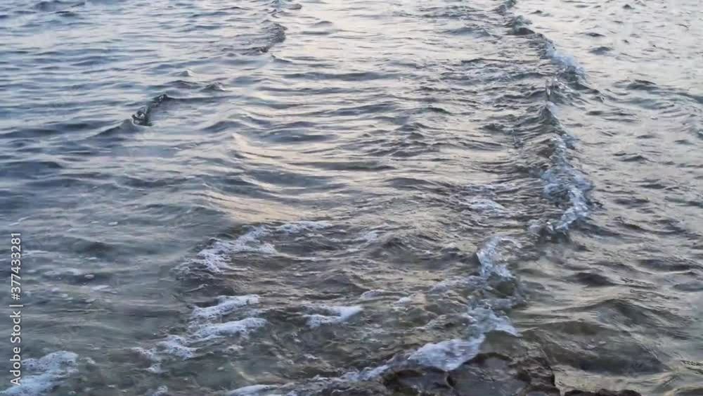 calm waves on the rocks calm waves on the rocks