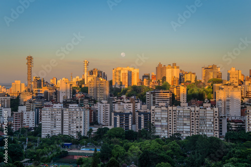 Принти на полотні Porto Alegre skyline with buildings partially illuminated by the sun
