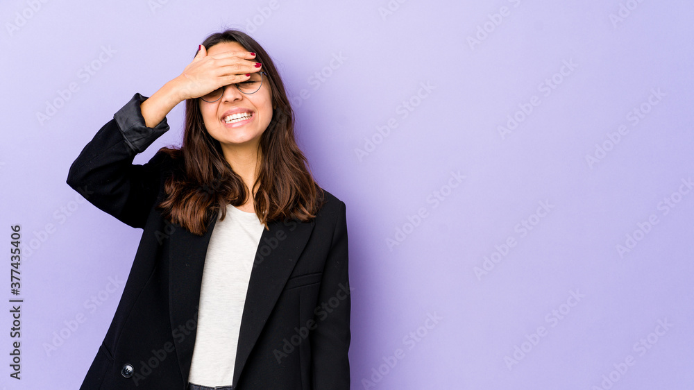 Young mixed race hispanic woman isolated covers eyes with hands, smiles broadly waiting for a surprise. Young mixed race hispanic woman isolated covers eyes with hands, smiles broadly waiting for a surprise.