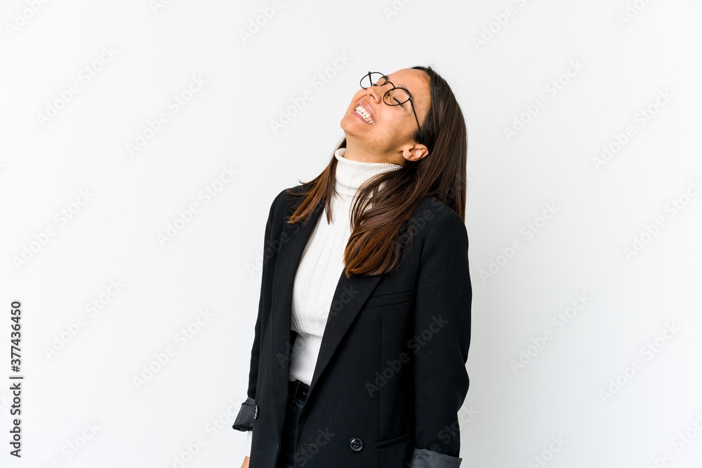 Young mixed race business woman isolated on white background relaxed and happy laughing, neck stretched showing teeth.