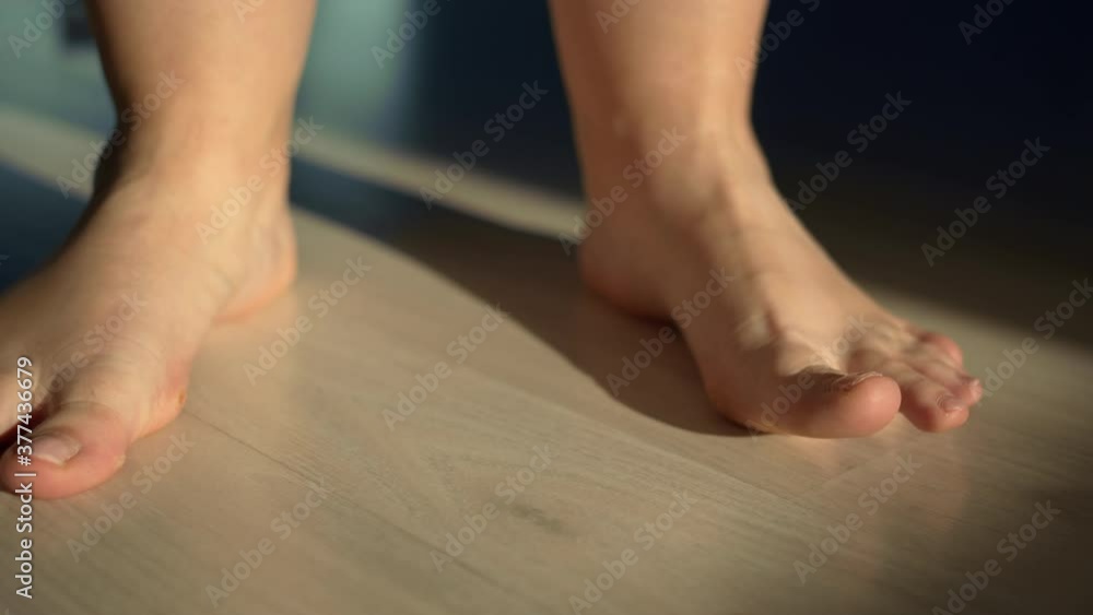tired woman feet on the floor at home tired woman feet on the floor at home