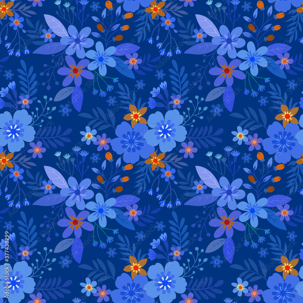 Seamless floral pattern on blue monochrome background fabric textile wallpaper.