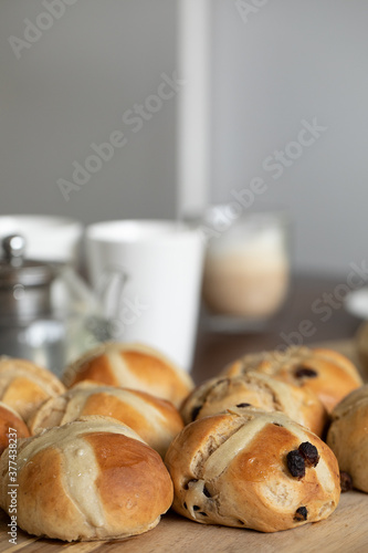 homemade hot cross buns on the table ready for smoko photo