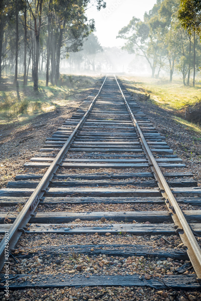 Railways lines running off into a foggy distance Railways lines running off into a foggy distance