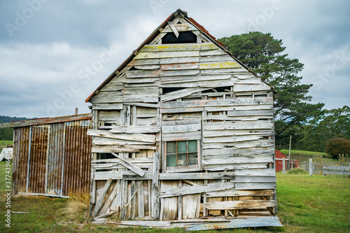 Weatherboards falling off an old wooden shed