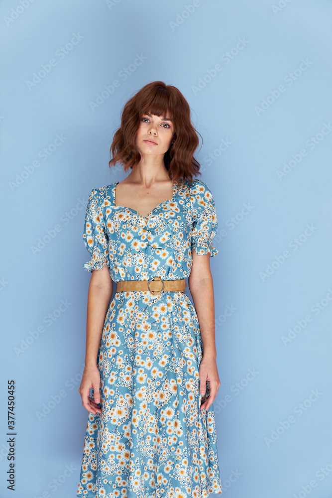 Woman in flower dress Look forward studio short hair Woman in flower dress Look forward studio short hair