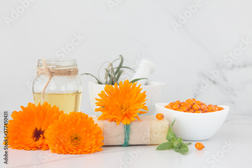 Sea buckthorn,handmade oil and soap natural cosmetics.
