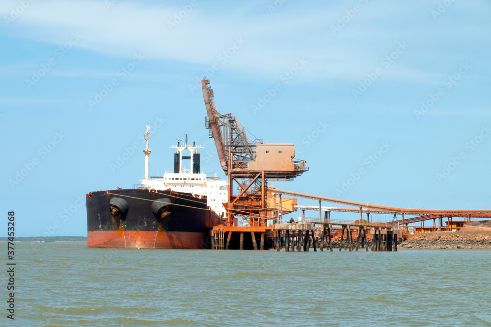 A 254 meter Ore Carrier Ship unloading Bauxite at Gladstone Harbour.