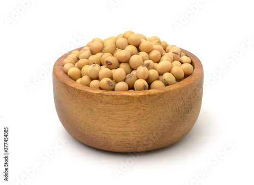 Soybean seeds in a wooden bowl isolated on white background,Agricultural products.