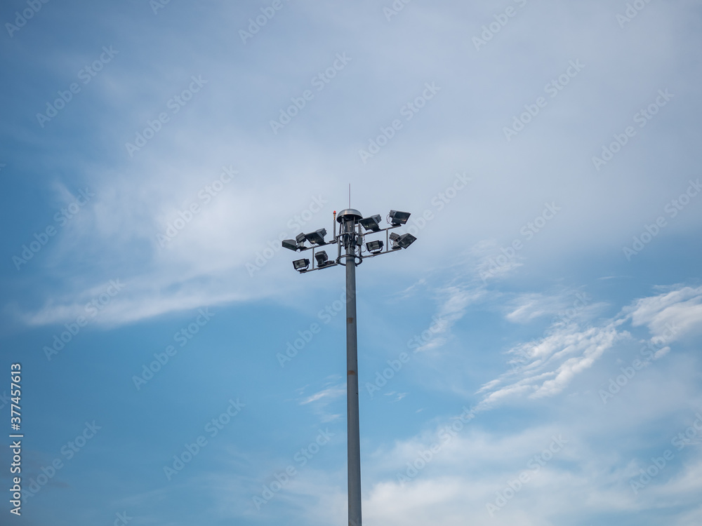 Spot light pole and the beautiful clouds and sky at airport. spotlight with radio control. Spot light pole and the beautiful clouds and sky at airport. spotlight with radio control.