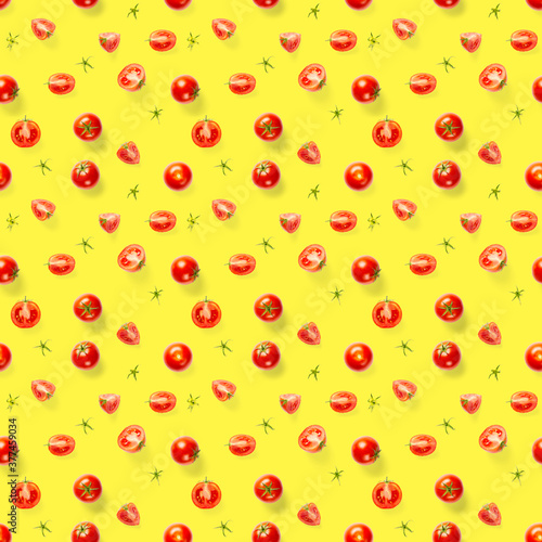 Seamless pattern with red ripe tomatoes. Tomato isolated on yellow background. Vegetable abstract seamless pattern. Organic Tomatoes flat lay