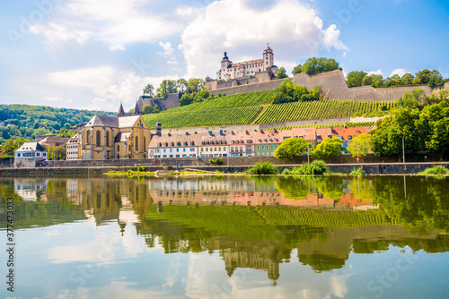 View at the Bank of Main river with Marienberg Castle and At.Bukard church in Wurzburg ,Germany photo
