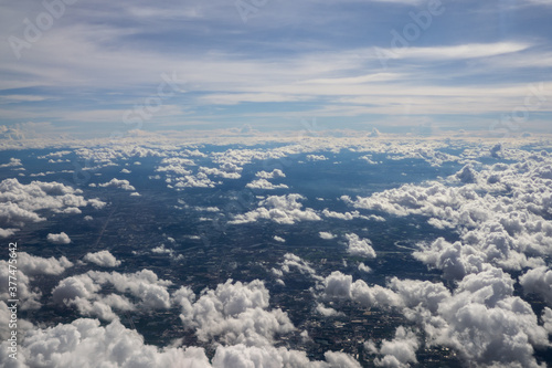 Aerial view landscape of Bangkok city in Thailand with cloud from aerial view airplane.