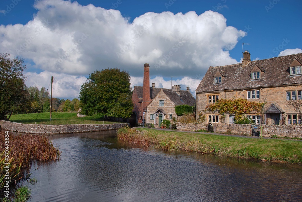 Naklejka premium The picturesque village of Lower Slaughter in the Cotswolds, England