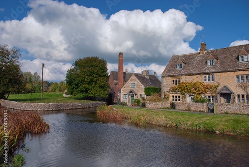 The picturesque village of Lower Slaughter in the Cotswolds, England photo