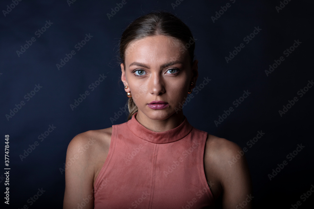 studio portrait of a young woman