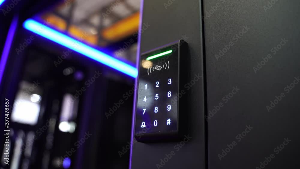 Staff push down electronic control machine with finger scan to access the door of or data center. The concept of data security or data access control.