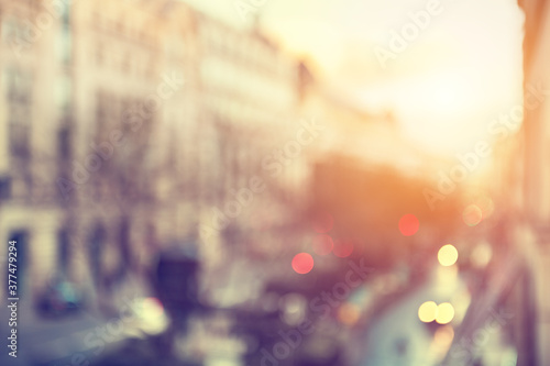 Blurred city background. Cityscape of Paris at sunset, France. 