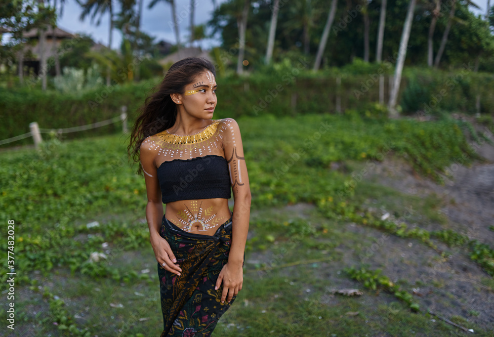 Beautiful ethnic girl with pictures on her body Beautiful ethnic girl with pictures on her body