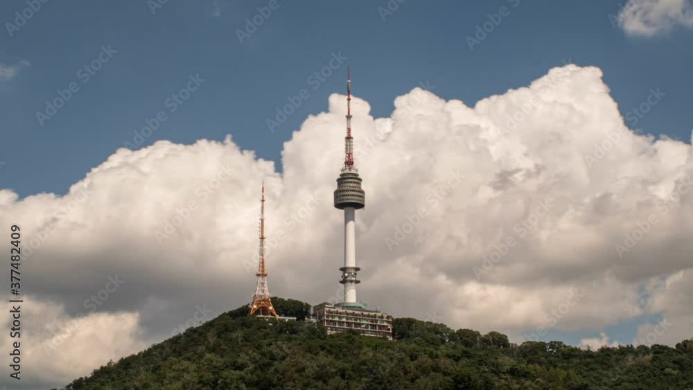 Namsan Tower Timelapse with flowing clouds passing behind on a very clean air day in Seoul. (Seoul Tower) Namsan Tower Timelapse with flowing clouds passing behind on a very clean air day in Seoul. (Seoul Tower)