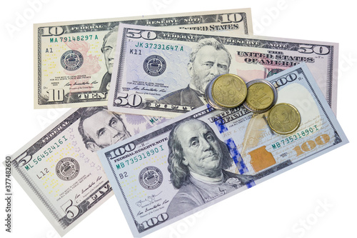 Various paper banknotes dollars and metal coins cents © golubka57