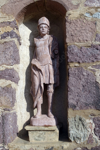 Kirche St. Kathrein in der Scharte - Skulptur in der Aussenmauer photo