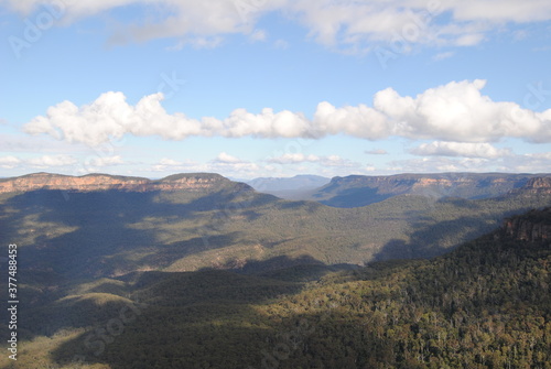 The cliffs and the hiking trails in the Blue Mountains national park in Australia on the sunny winter day © Natalie