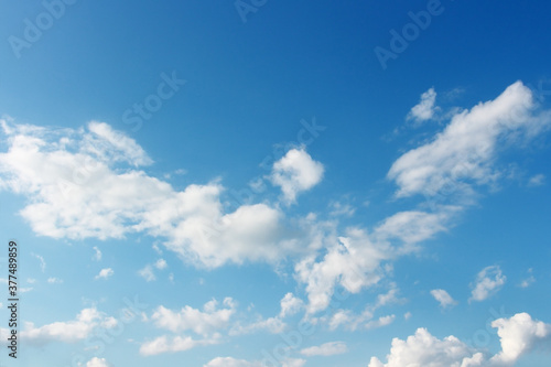 Blank sky surface with small clouds