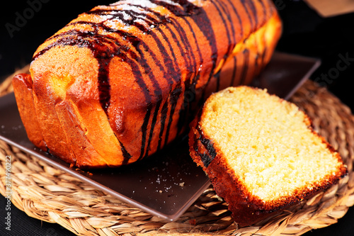 Homemade yogurt cake with caramel coating.