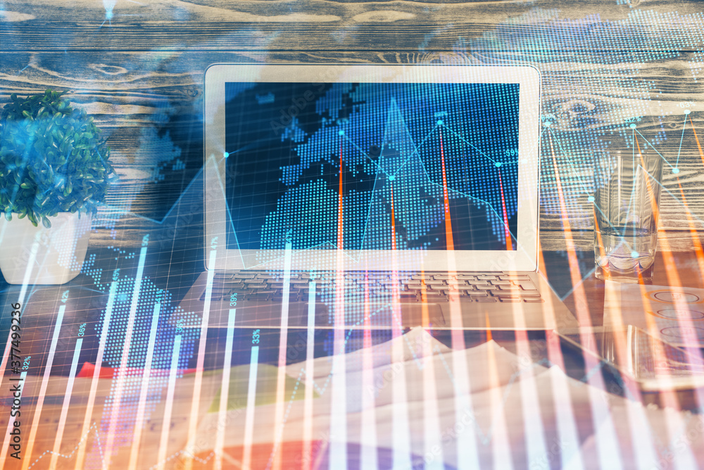 Multi exposure of forex graph and work space with computer. Concept of international online trading. Multi exposure of forex graph and work space with computer. Concept of international online trading.