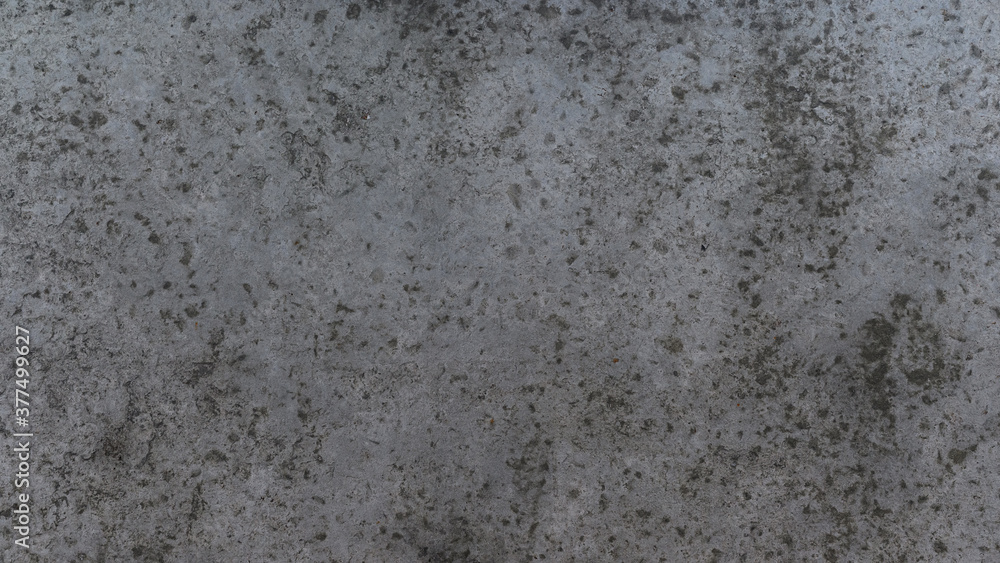 concrete wall texture with spots and pits
