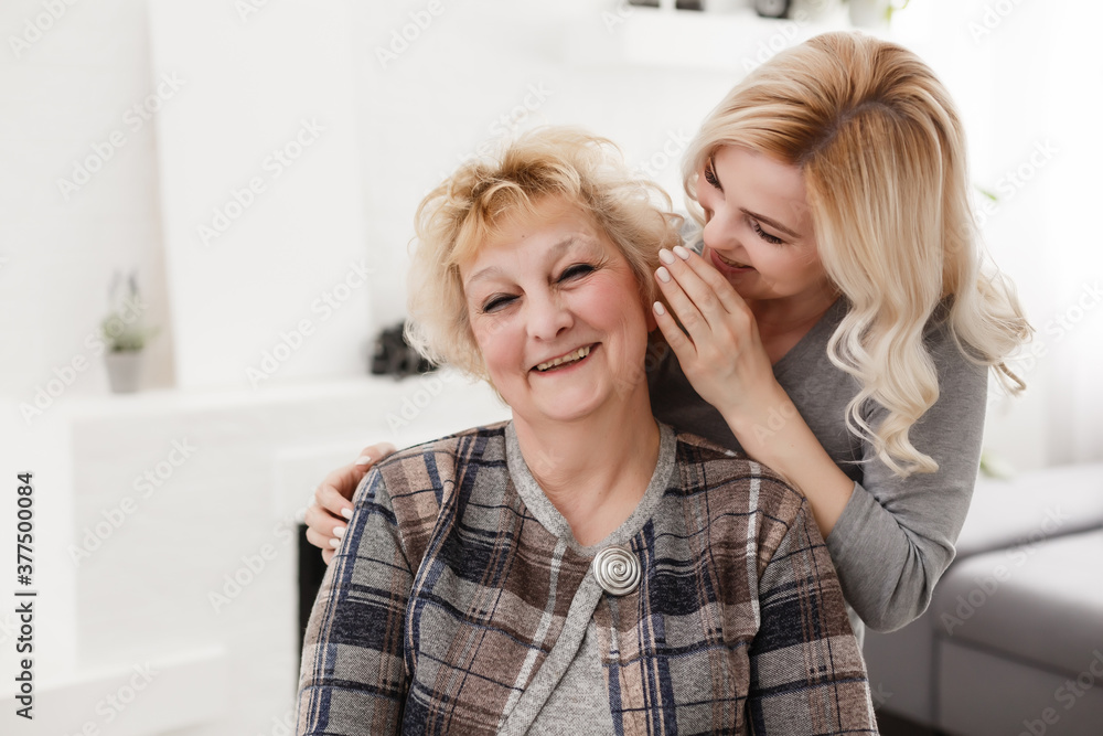 pretty woman and senior mother at home pretty woman and senior mother at home