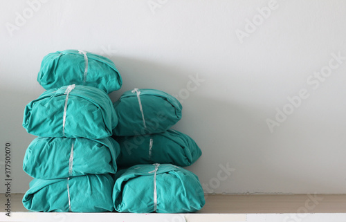 wrap of green fabric cloth used for surgery in shelf sterile