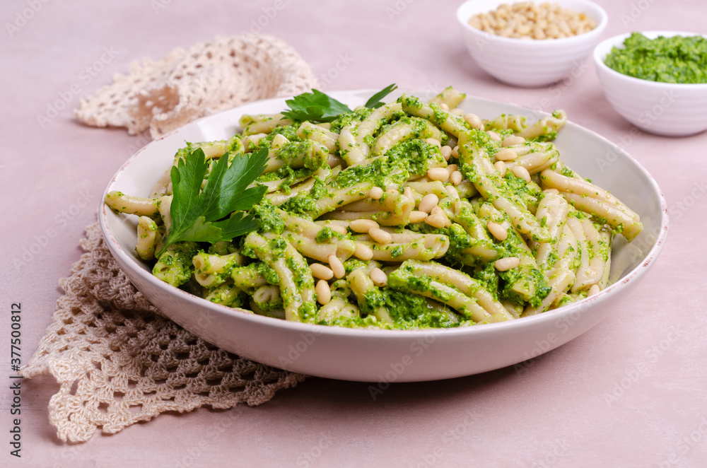 Traditional pasta with green sauce