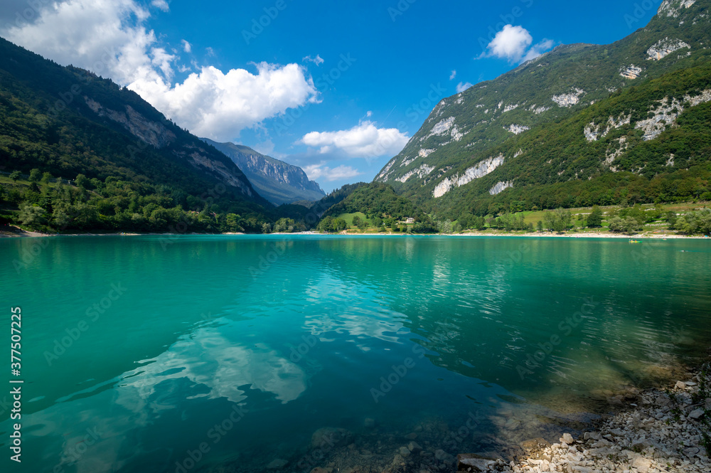 Lake Tenno in Garda Trentino, Trento. Blue-green in color, a few kilometers from Riva del Garda can be reached via the wine and flavors route from Lake Garda or the Brenta Dolomites. Italy Alps.