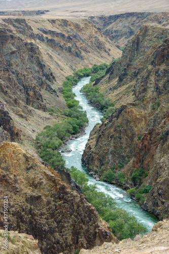 River flowing in the bottom of canyon © Olesya