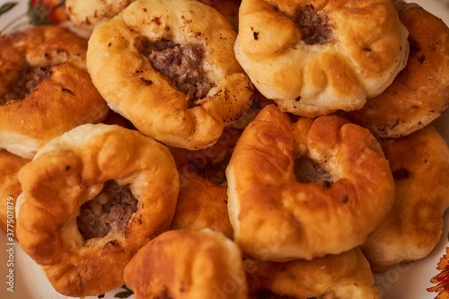 Homemade Meat pies. The traditional Kazakh, Tatar and Bashkir food - belyashi. Close-up.