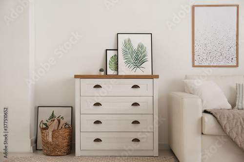 Modern chest of drawers in living room. Interior design