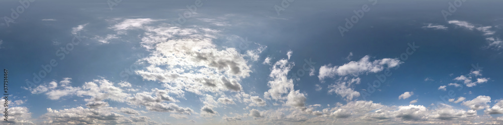 Seamless blue sky hdri panorama 360 degrees angle view with zenith and beautiful clouds for use in 3d graphics as sky dome or edit drone shot