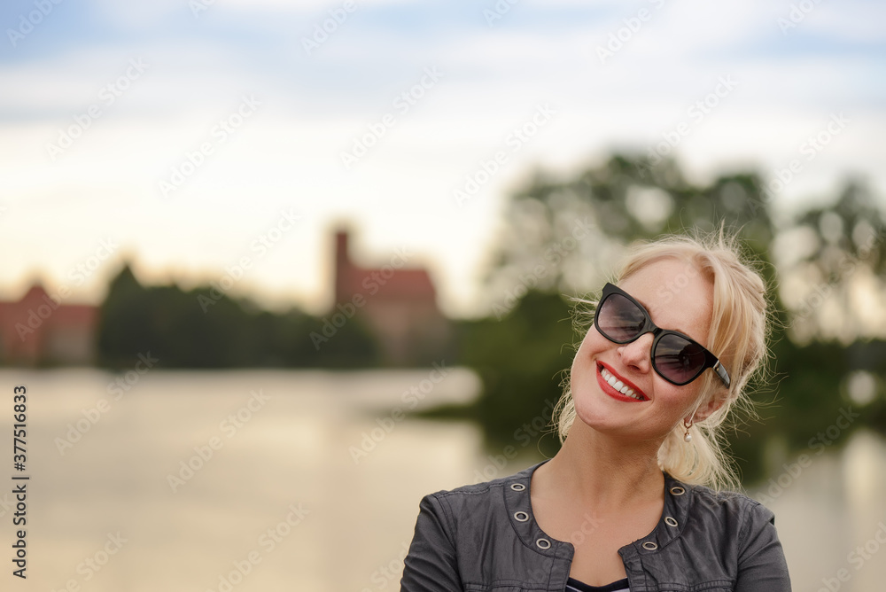 Blond beautiful woman portrait in park Blond beautiful woman portrait in park